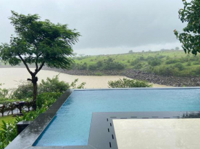 SaffronStays Glistening Waters & Spa